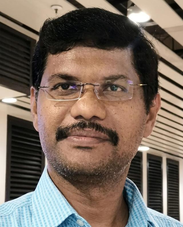 Dr. K. Suresh
